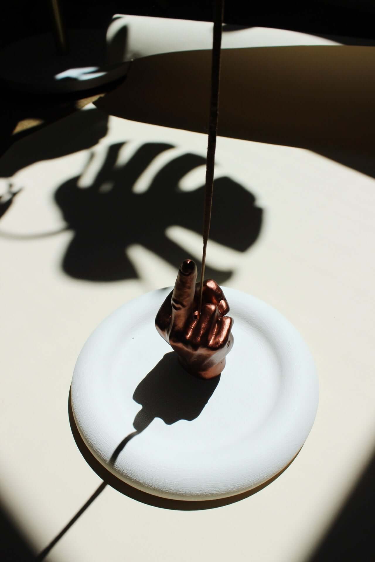 middle finger shaped acquired taste incense stick holder with ash catching tray