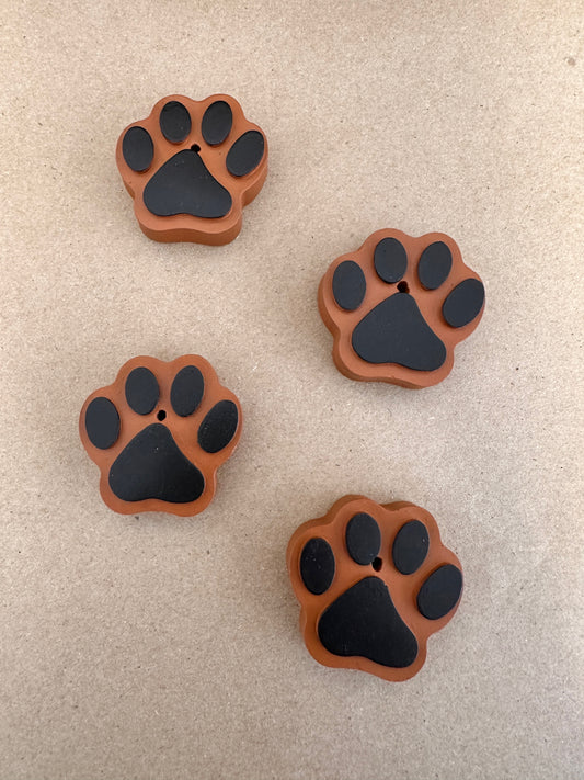 Four incense holder dog paws