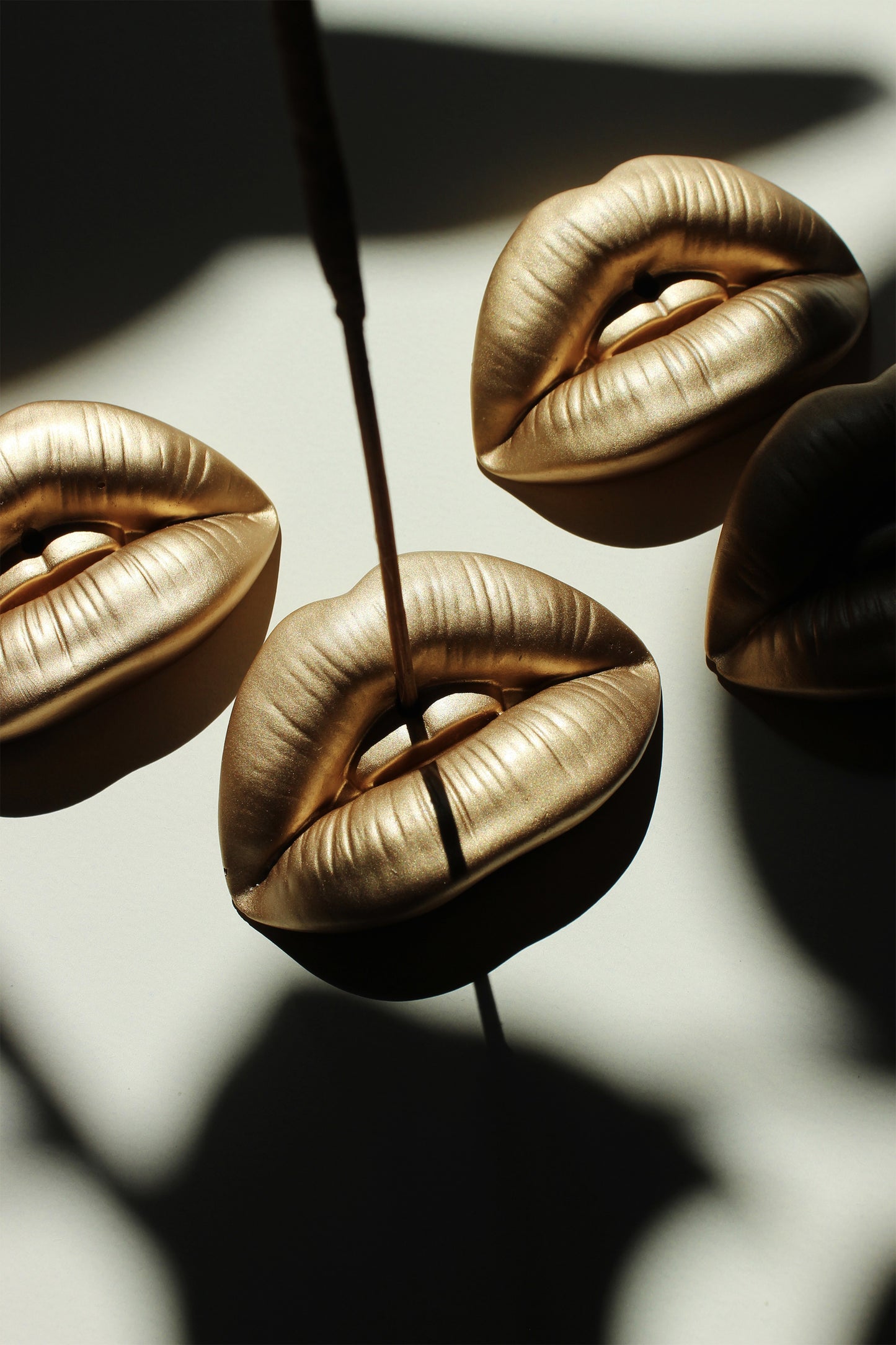Bronze Lip Incense stick holder