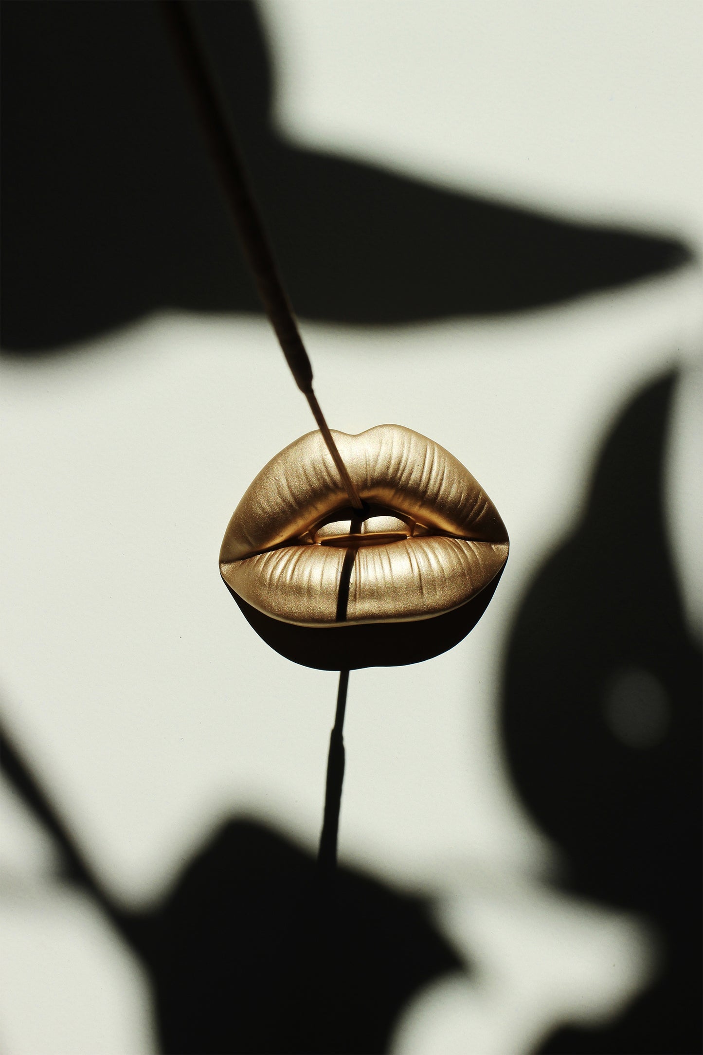 Bronze Lip Incense stick holder