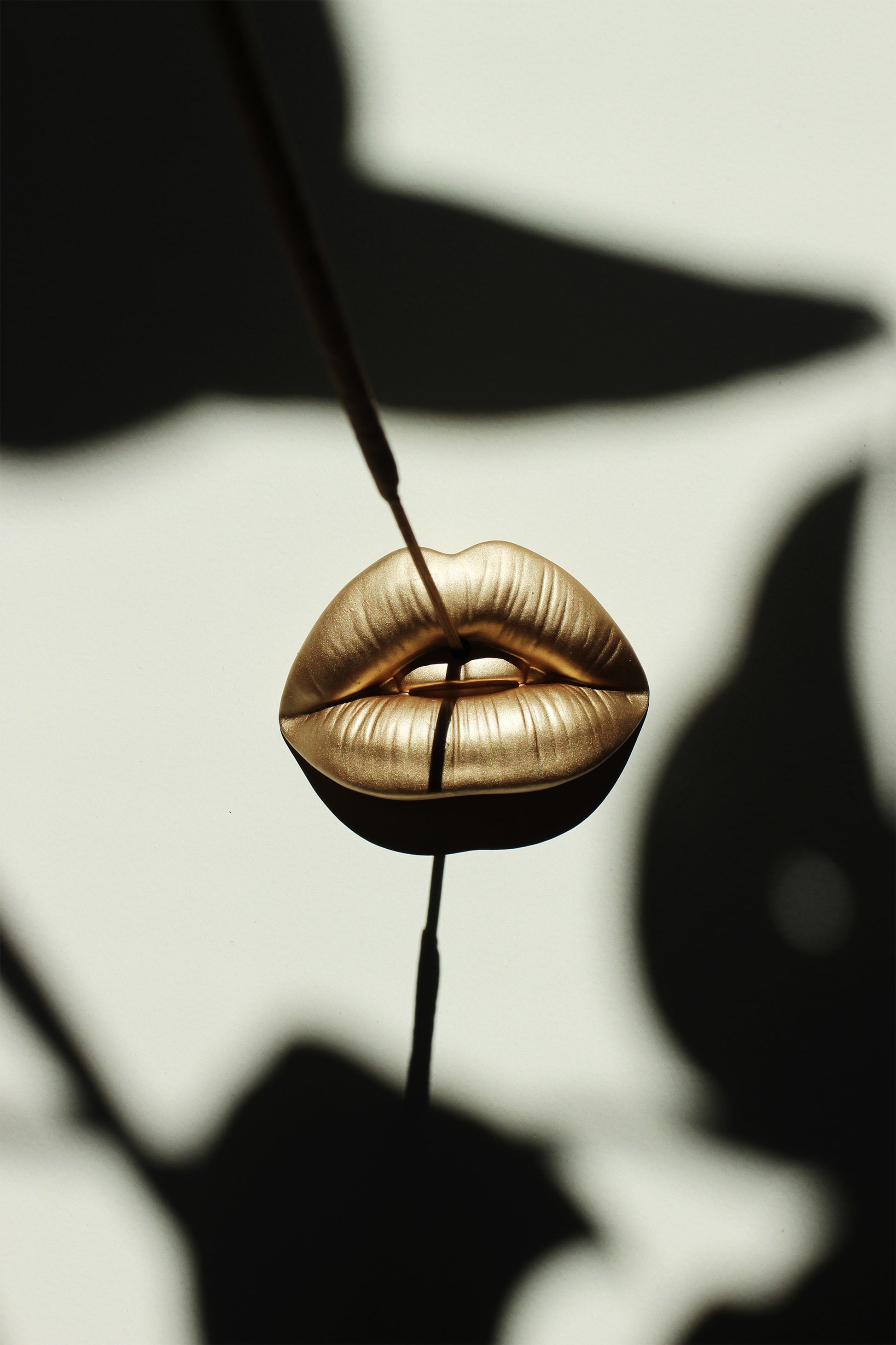 Bronze Lip Incense stick holder