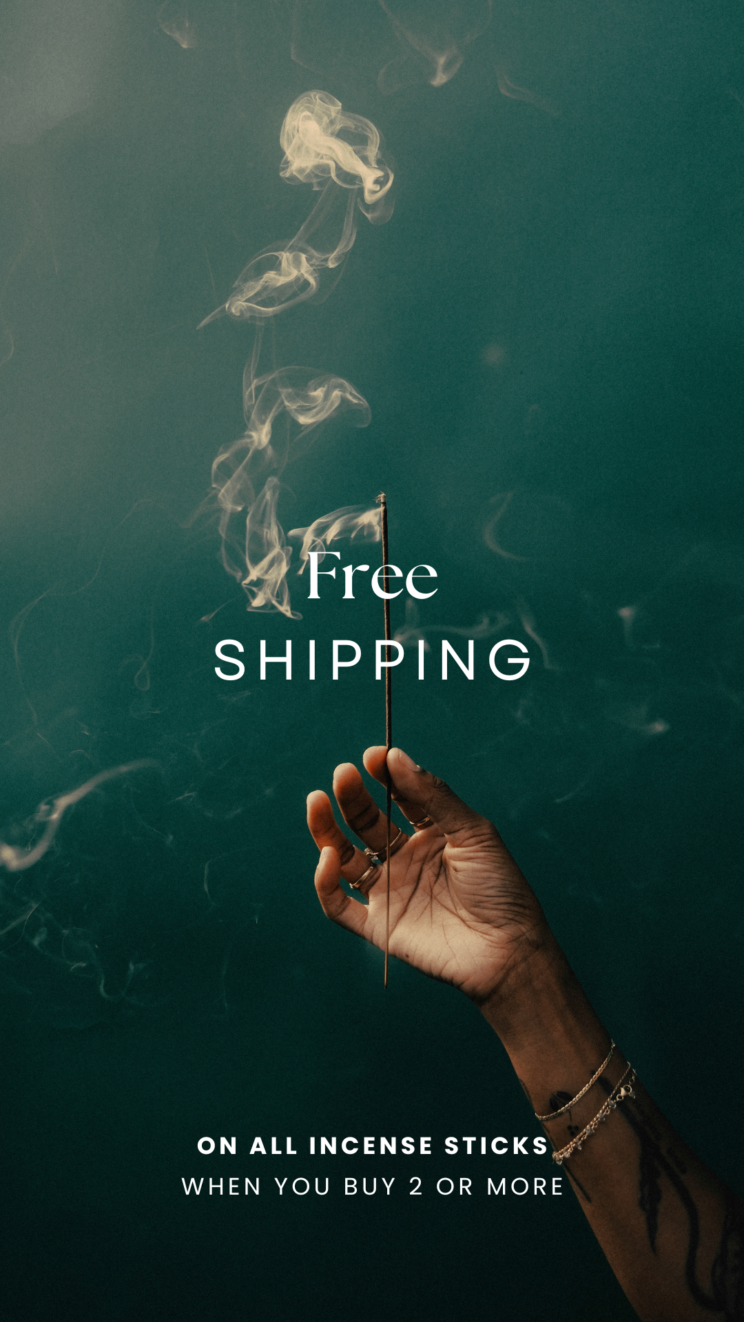 incense smoldering smoke being held 