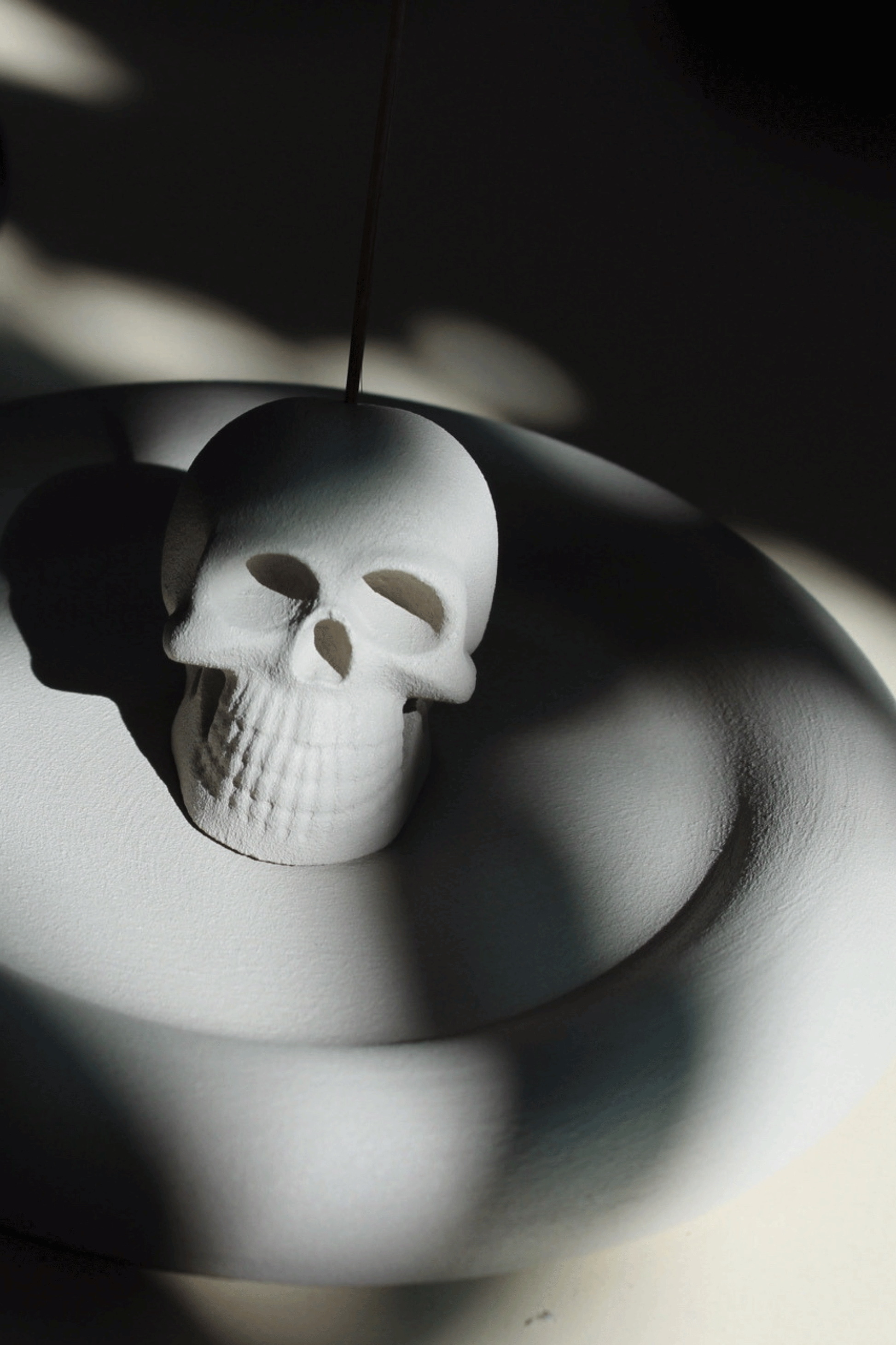 grey skull incense stick holder with ash tray