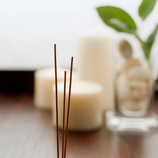 A picture of three instant holders near candles